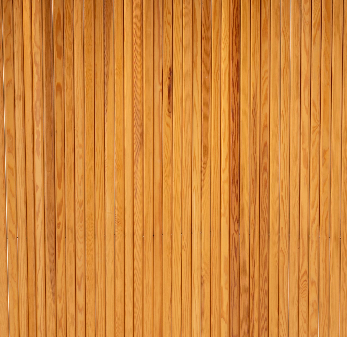 Close-up of Alvar Aalto Screen 100 room divider showing vertical oversized pine slats with natural grain finish