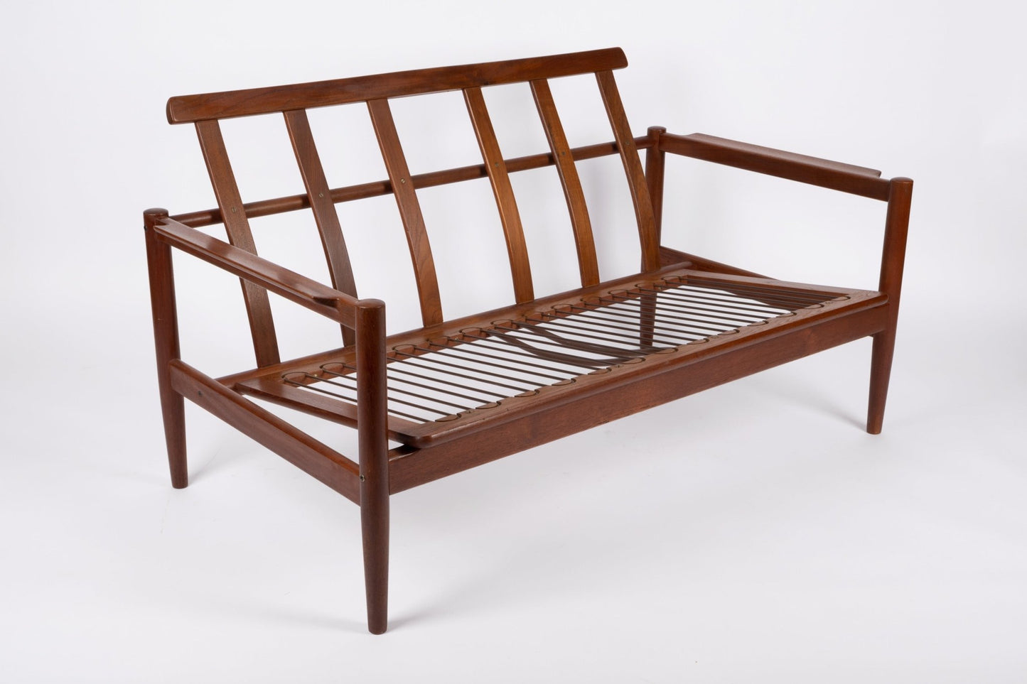 1960s Borge Jensen teak settee frame with sculpted armrests and slatted back, Danish mid-century design