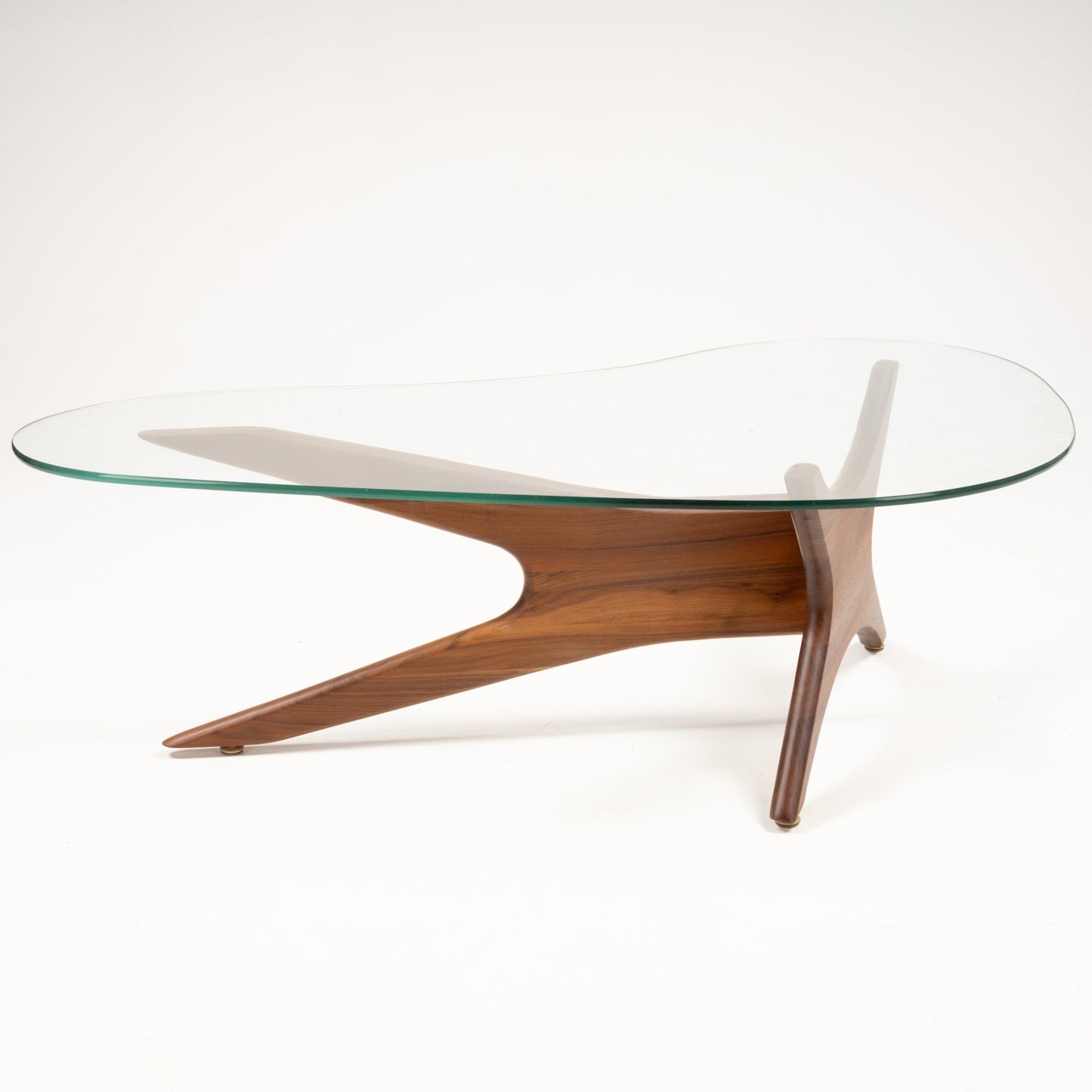Angled view of Adrian Pearsall "Jacks" coffee table with sculptural walnut base and asymmetrical glass top