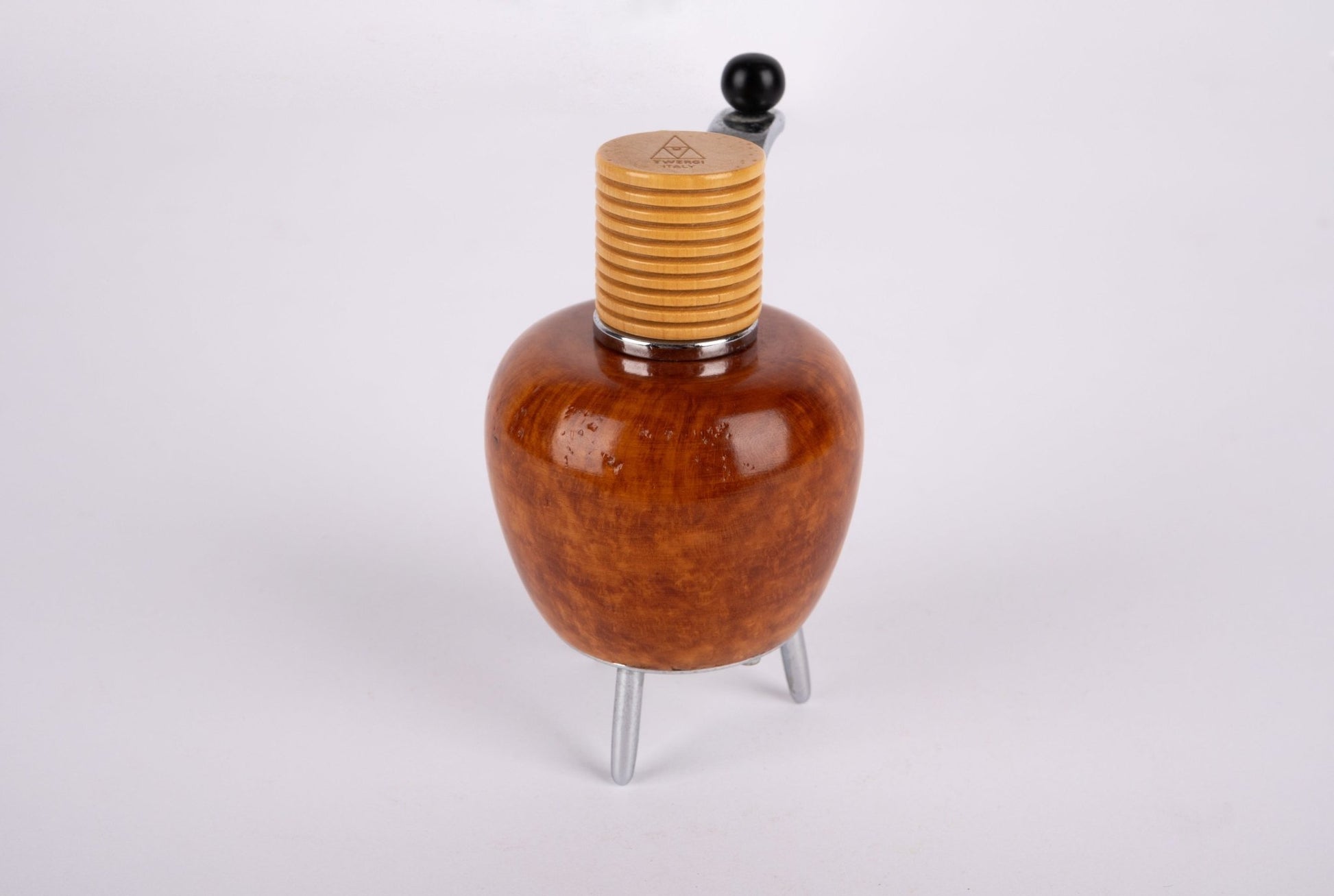 Alessi Twergi 1990s cherry wood peppermill with ribbed wooden top and three metal legs designed by Adalberto Pironi