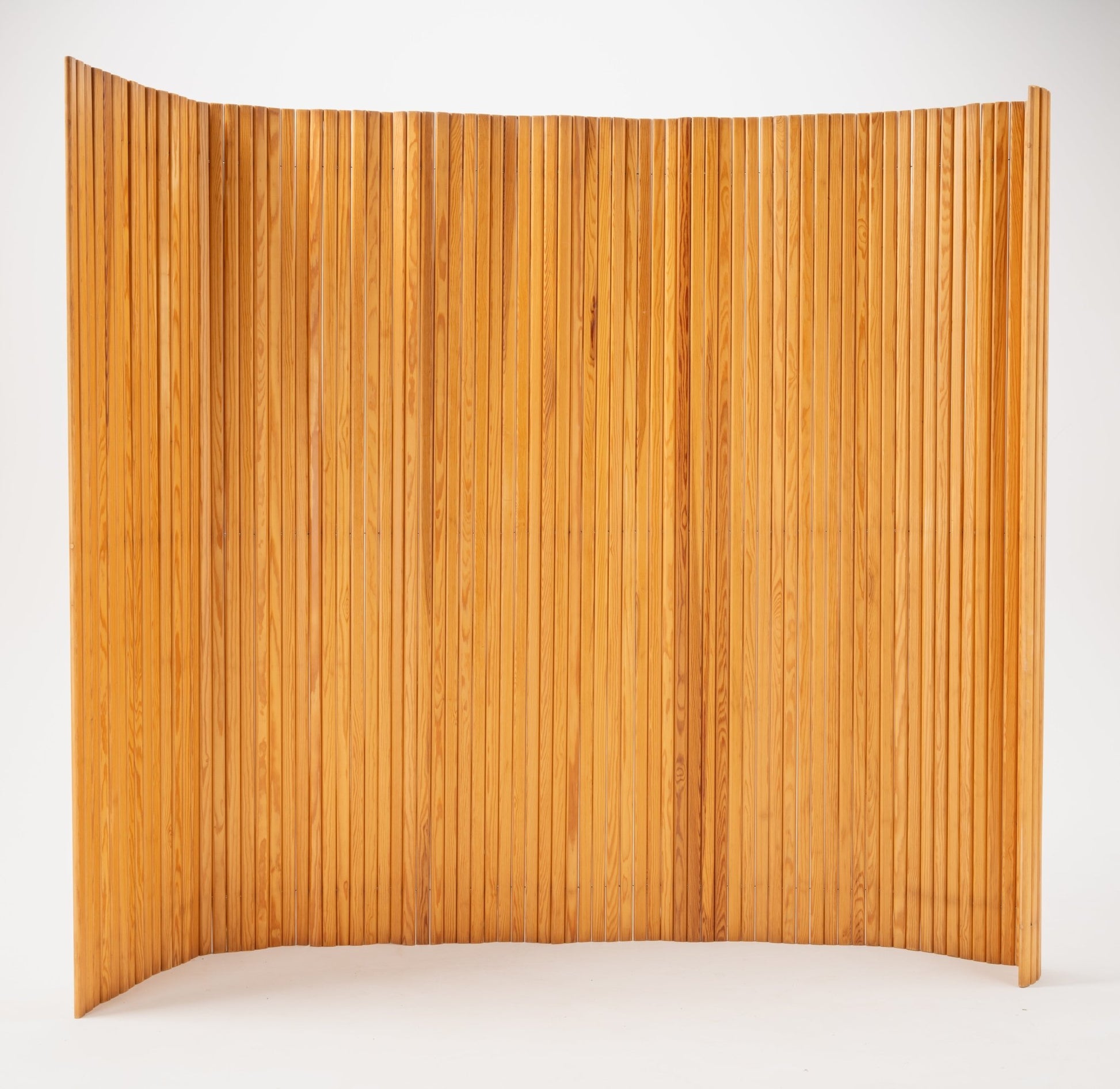 Alvar Aalto Screen 100 room divider with curved vertical pine slats and natural finish on white background