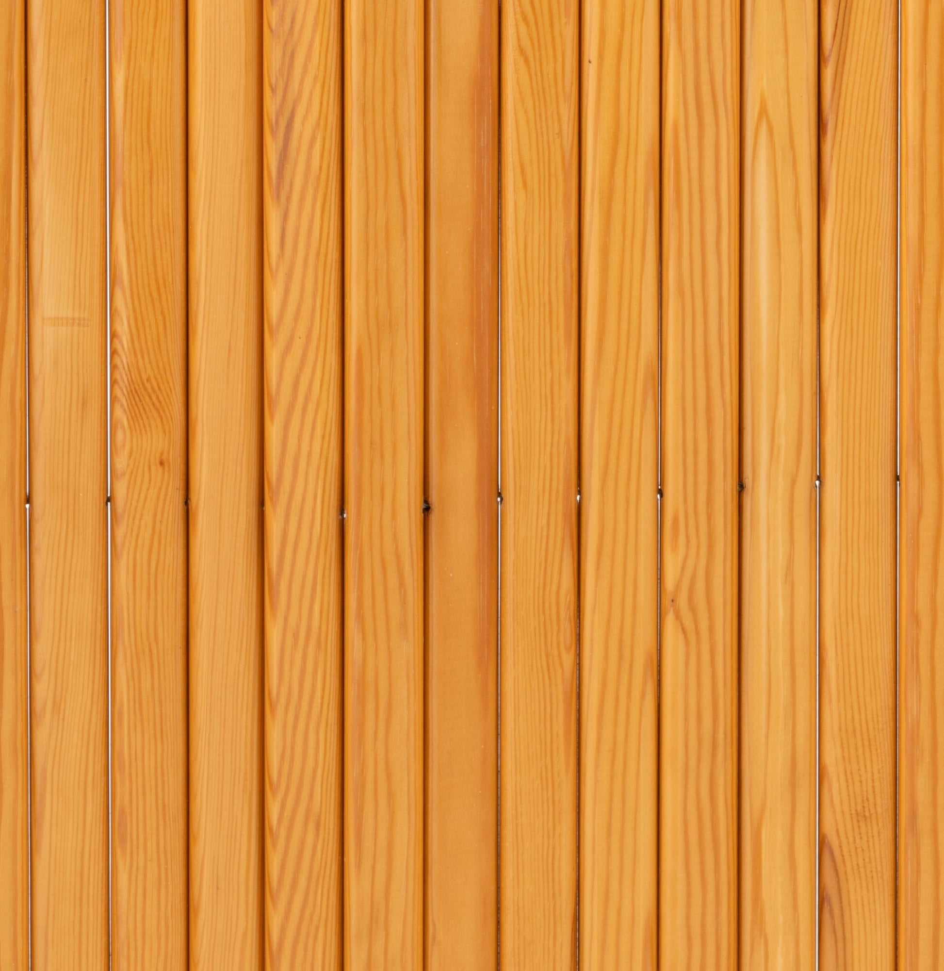 Close-up of vertical pine slats with natural wood grain finish on Alvar Aalto 'Screen 100' room divider from Finland