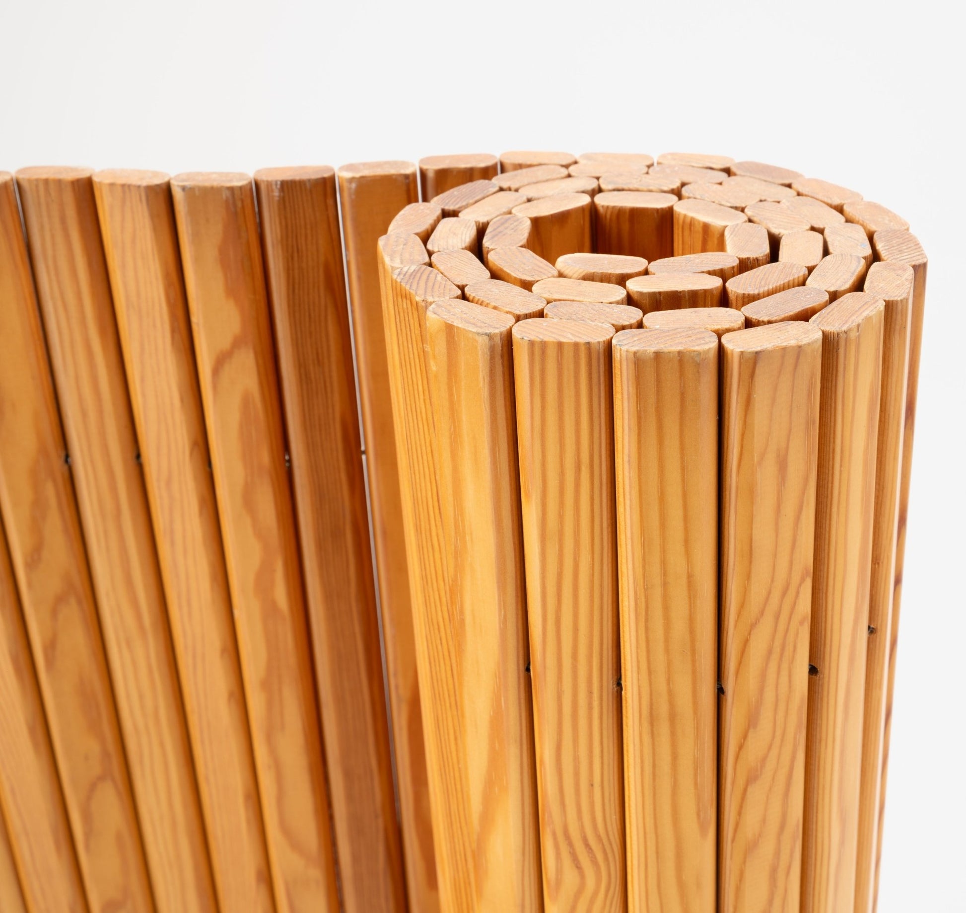 Rolled Alvar Aalto 'Screen 100' room divider showing vertical oversized pine slats with natural finish