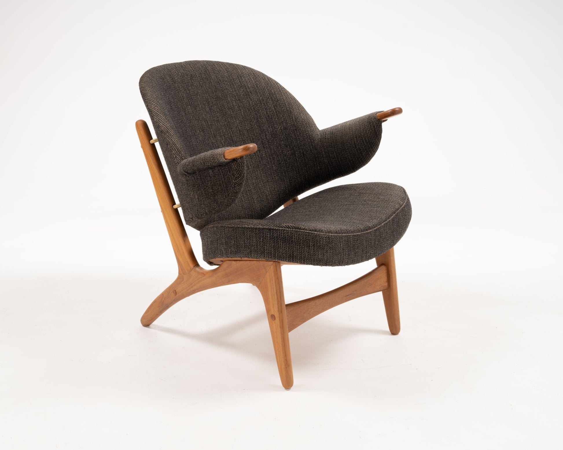 Arne Hovmand-Olsen Danish teak chair from the 1950s with winged backrest and dark upholstery