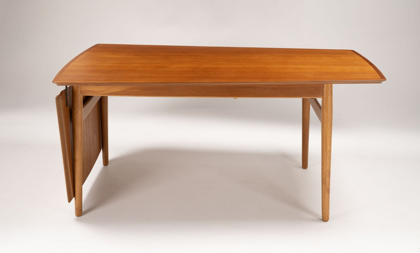 Arne Vodder mid-century modern teak drop leaf desk with tapered legs and hinged side extension leaf