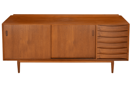 Arne Vodder Reversible-Drawer Teak Credenza for Sibast featuring sleek sliding doors and a column of sculpted drawers, crafted from warm teak wood in a mid century modern style.
