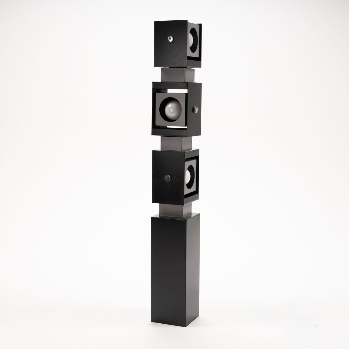 Arteluce Swivel Steel Floor Lamp in black steel with three stacked square spotlights on a tall rectangular base for modern interior lighting