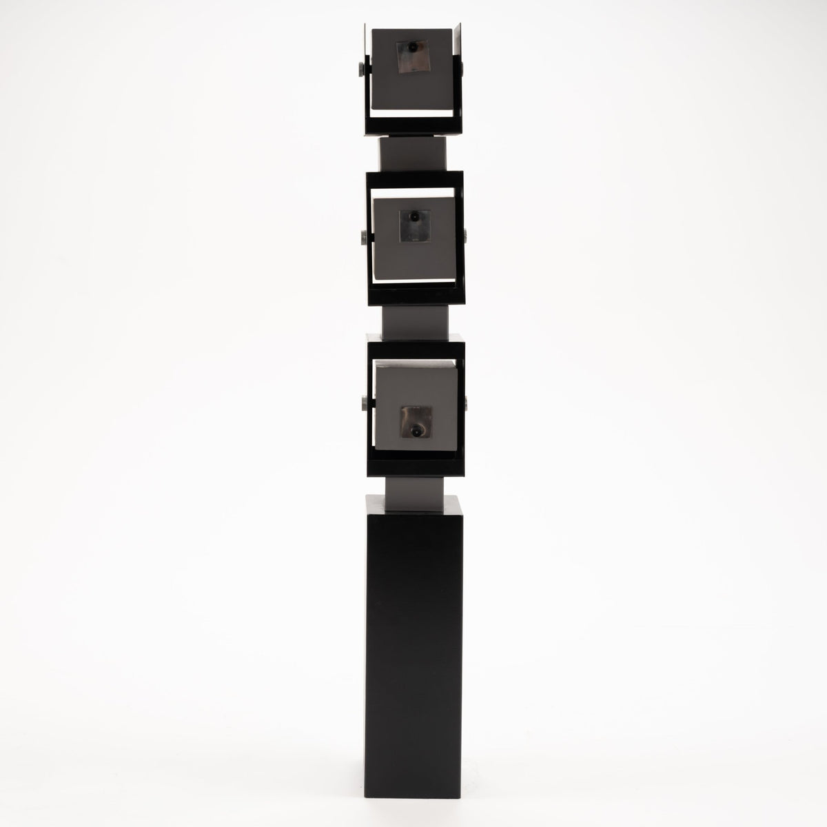 Arteluce Swivel Steel Floor Lamp in black steel with three stacked square spotlight housings and a tall rectangular pedestal for contemporary interior lighting