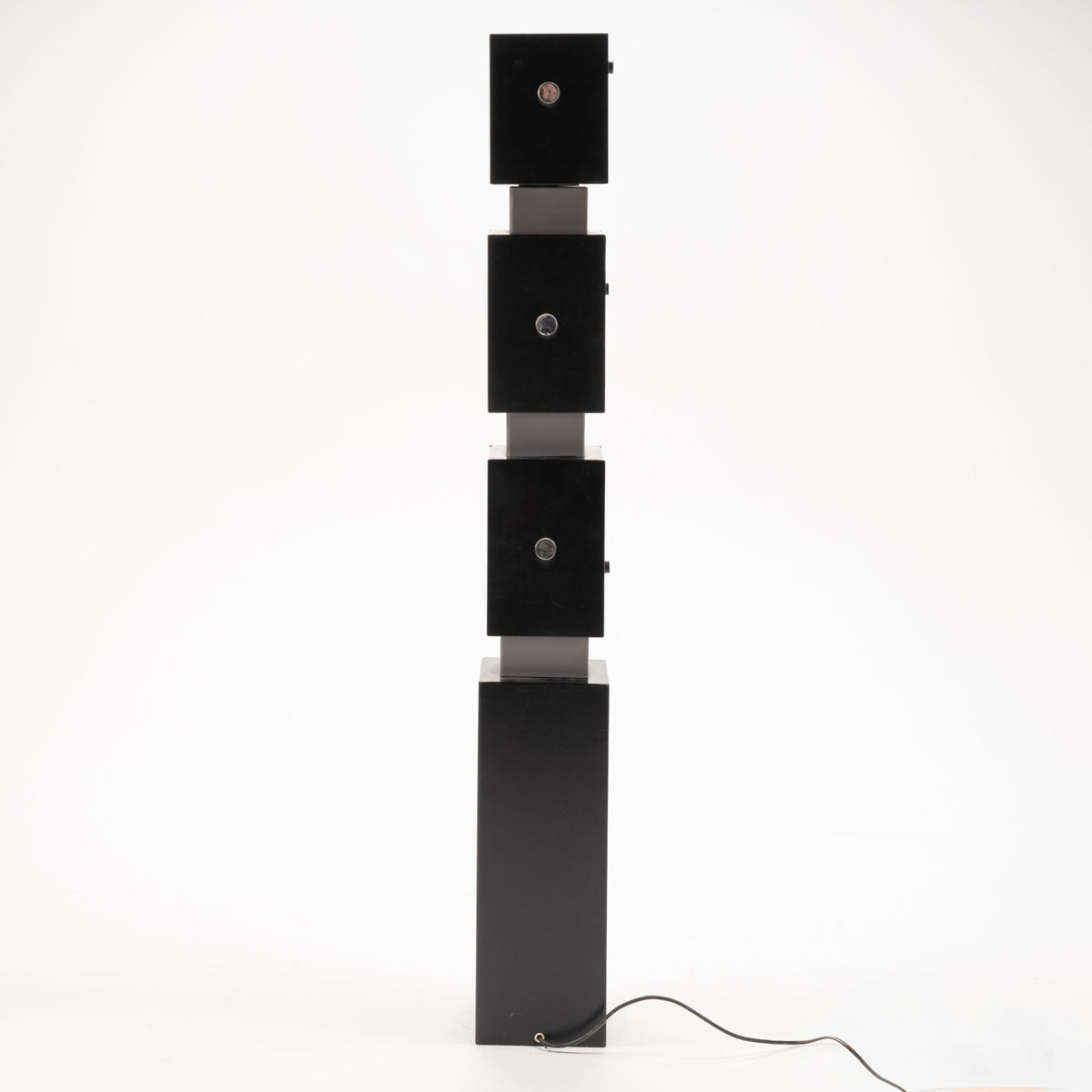 Arteluce Swivel Steel Floor Lamp in black steel with three stacked square light housings and tall rectangular base for modern interior lighting