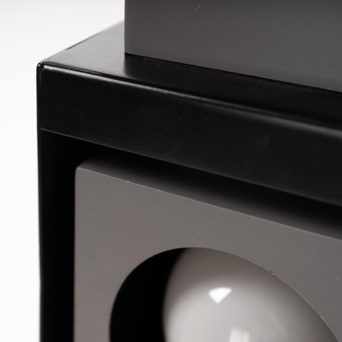 Arteluce Swivel Steel Floor Lamp closeup showing black steel frame and recessed square spotlight with visible bulb for modern interior lighting