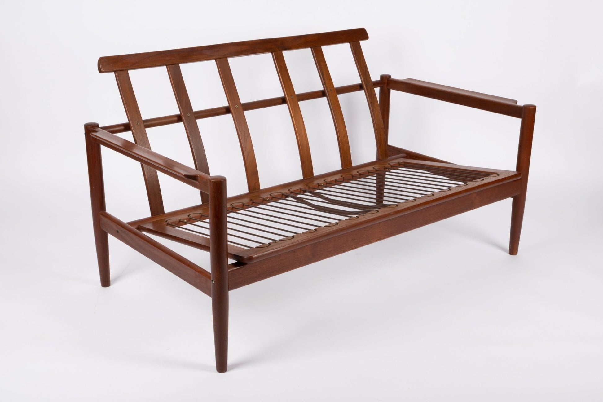 1960s Borge Jensen teak settee frame with sculpted armrests and slatted back, Danish mid-century design
