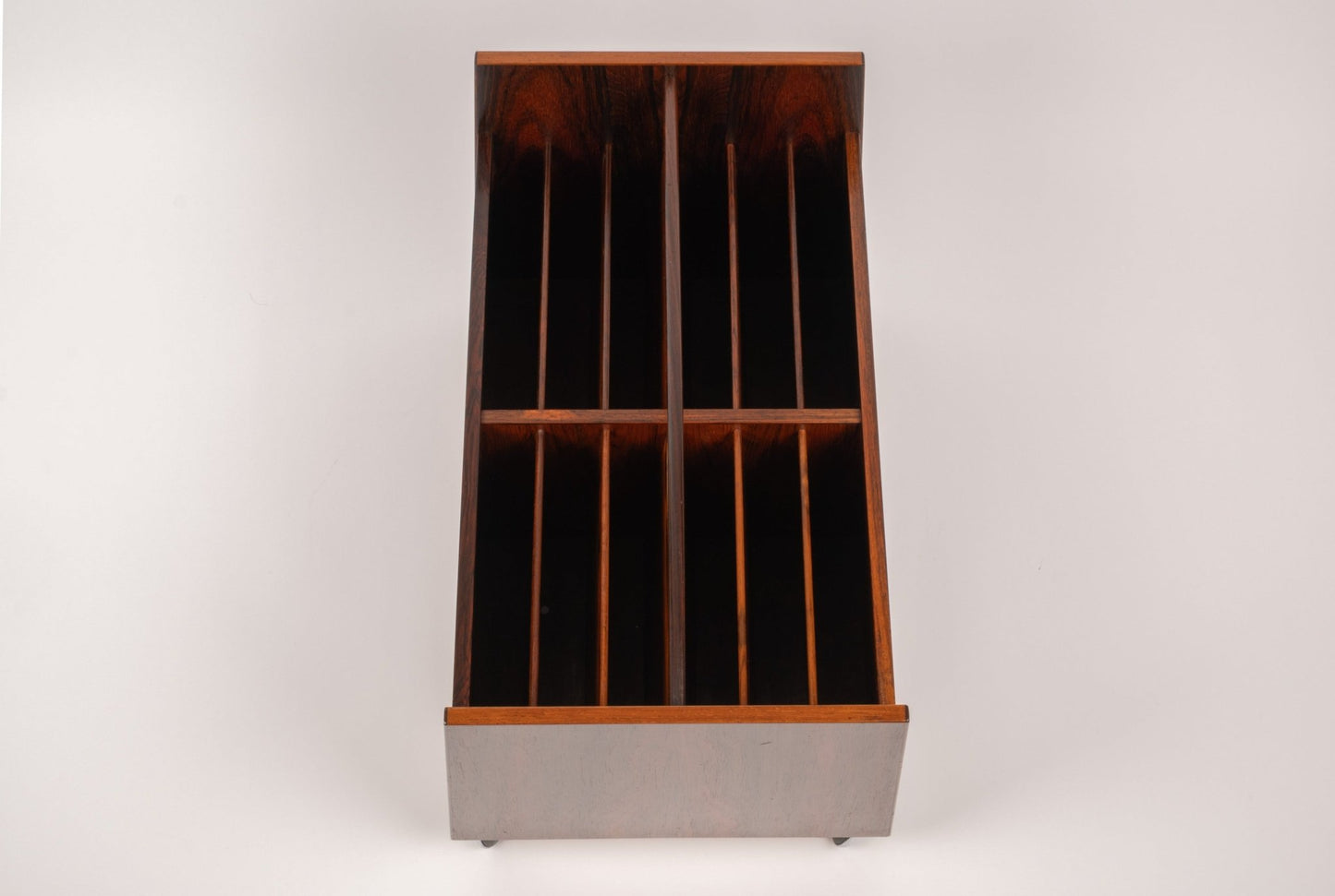 Bruksbo rosewood rolling cart with double-wide open compartments and castors for easy mobility on white background