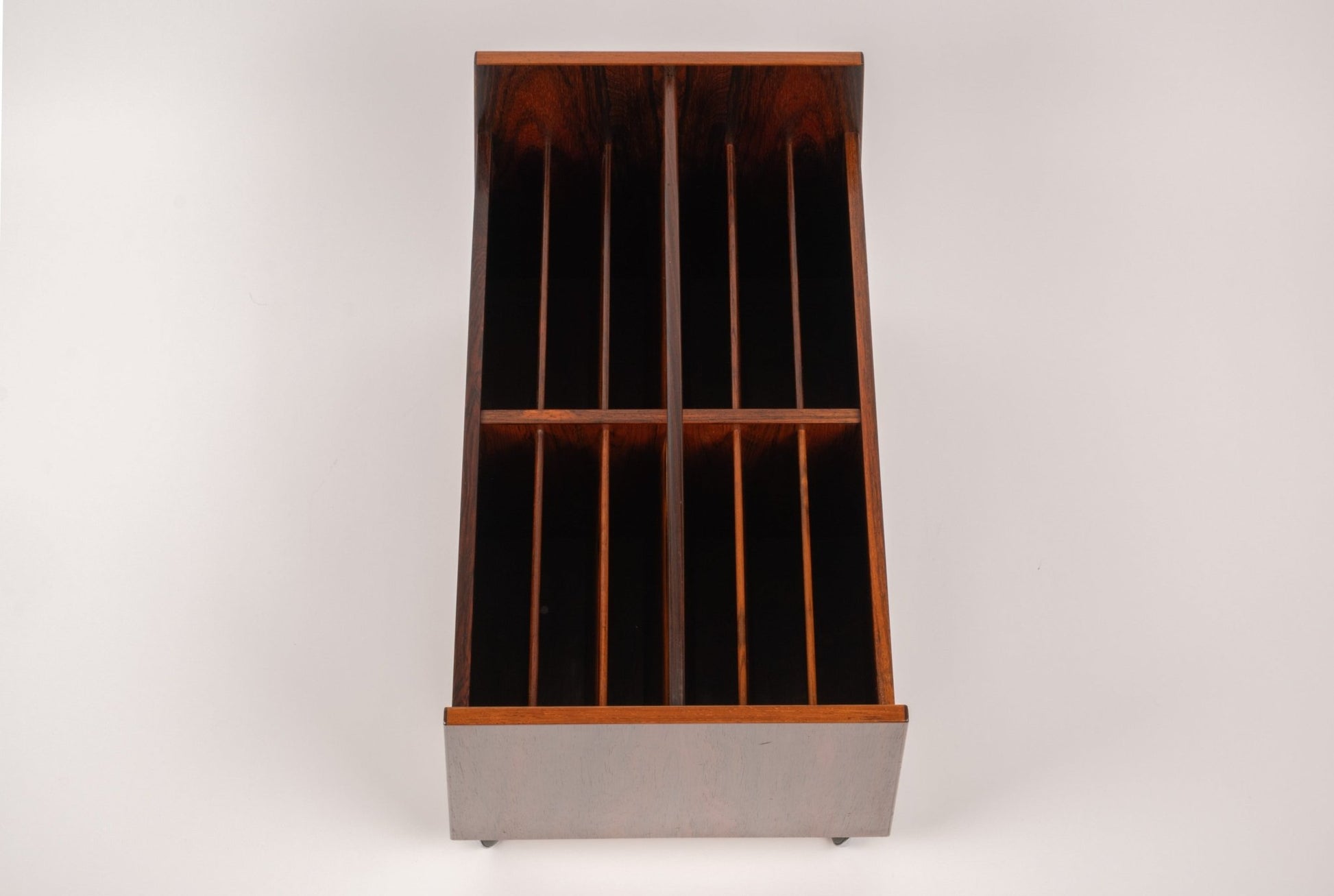Bruksbo rosewood rolling cart with double-wide open compartments and castors for easy mobility on white background