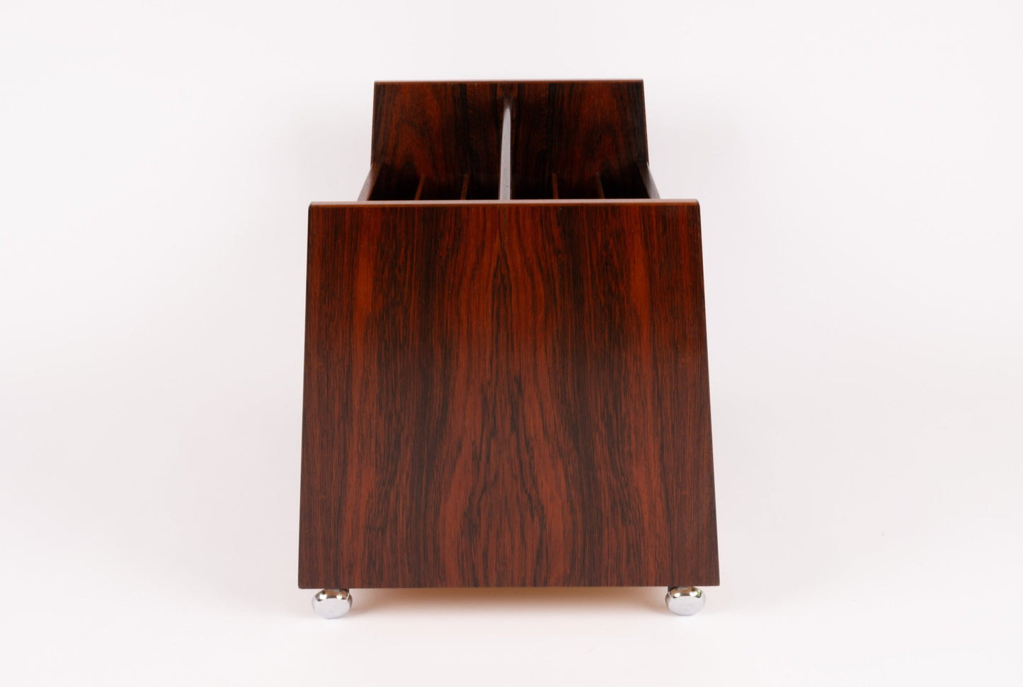 Double-wide Bruksbo rosewood rolling cart with castors, designed for storing magazines or records.