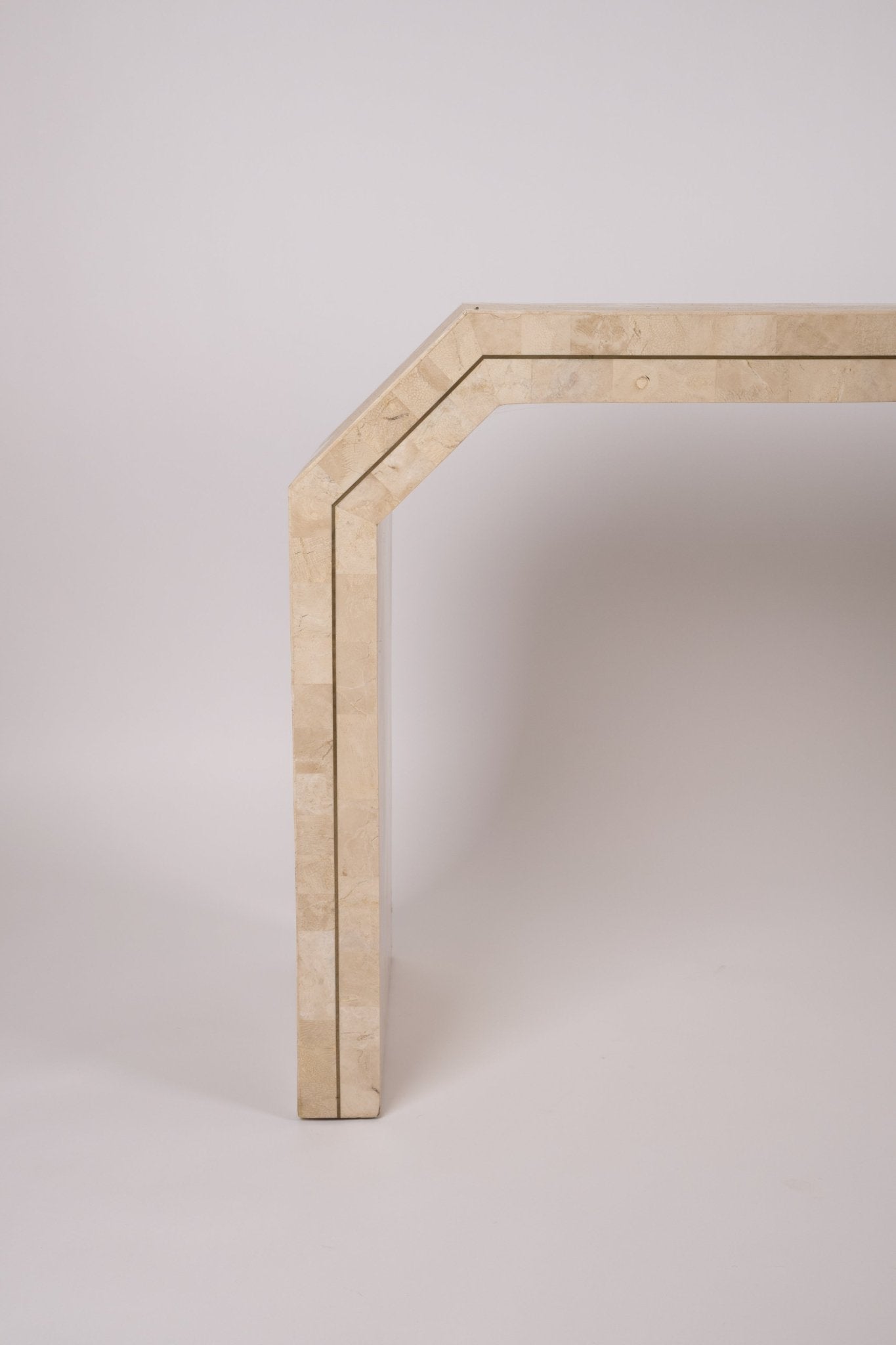 Corner detail of 1980s Casa Bique tessellated marble console table with brass inlay and brick pattern surface