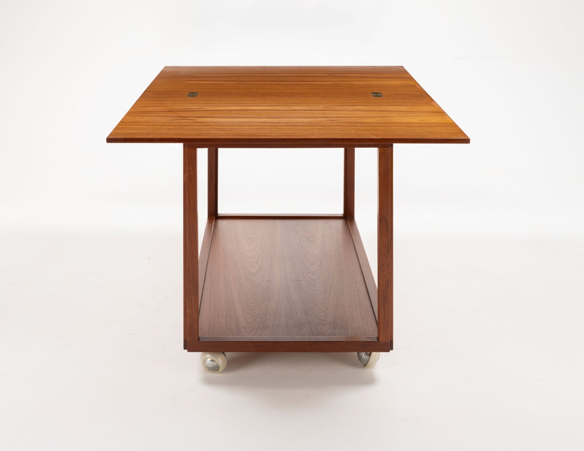 Danish teak expanding bar cart with clean lines and lower shelf on casters for versatile entertaining use