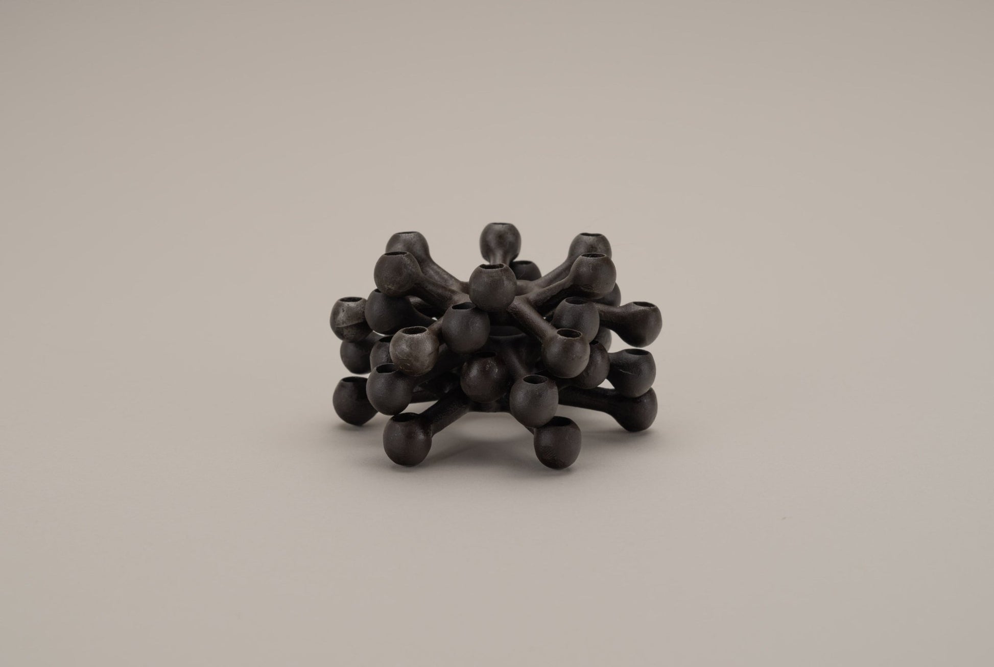 Dansk cast iron Spider candleholder set designed by Jens Quistgaard with multi-tier sculptural mid-century modern style