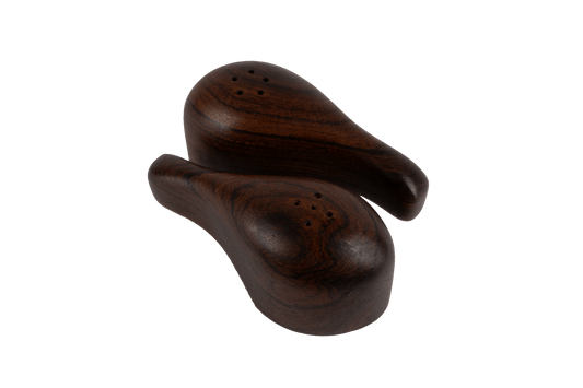 Pair of Don Shoemaker interlocking salt and pepper shakers sculpted from solid rosewood by Mexican artisans Señal.