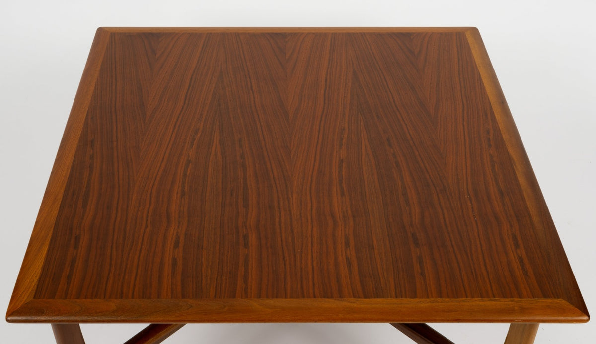 DUX Square Coffee Table by Ohlsson with a warm walnut square tabletop rich wood grain and angled edges against a white background for mid century modern furniture