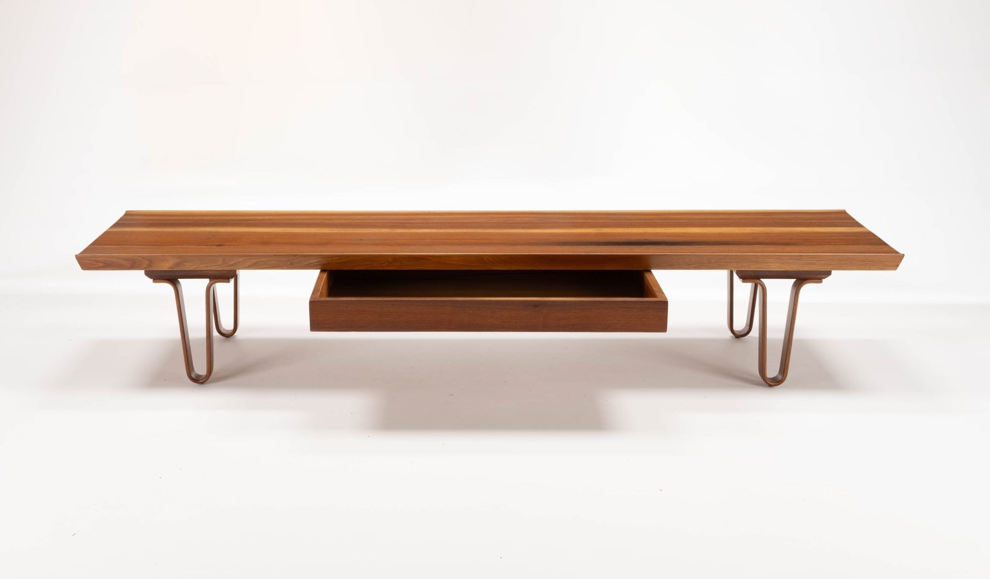 Edward Wormley "Long John" solid walnut coffee table with bentwood hairpin legs and sculpted edges with drawer below