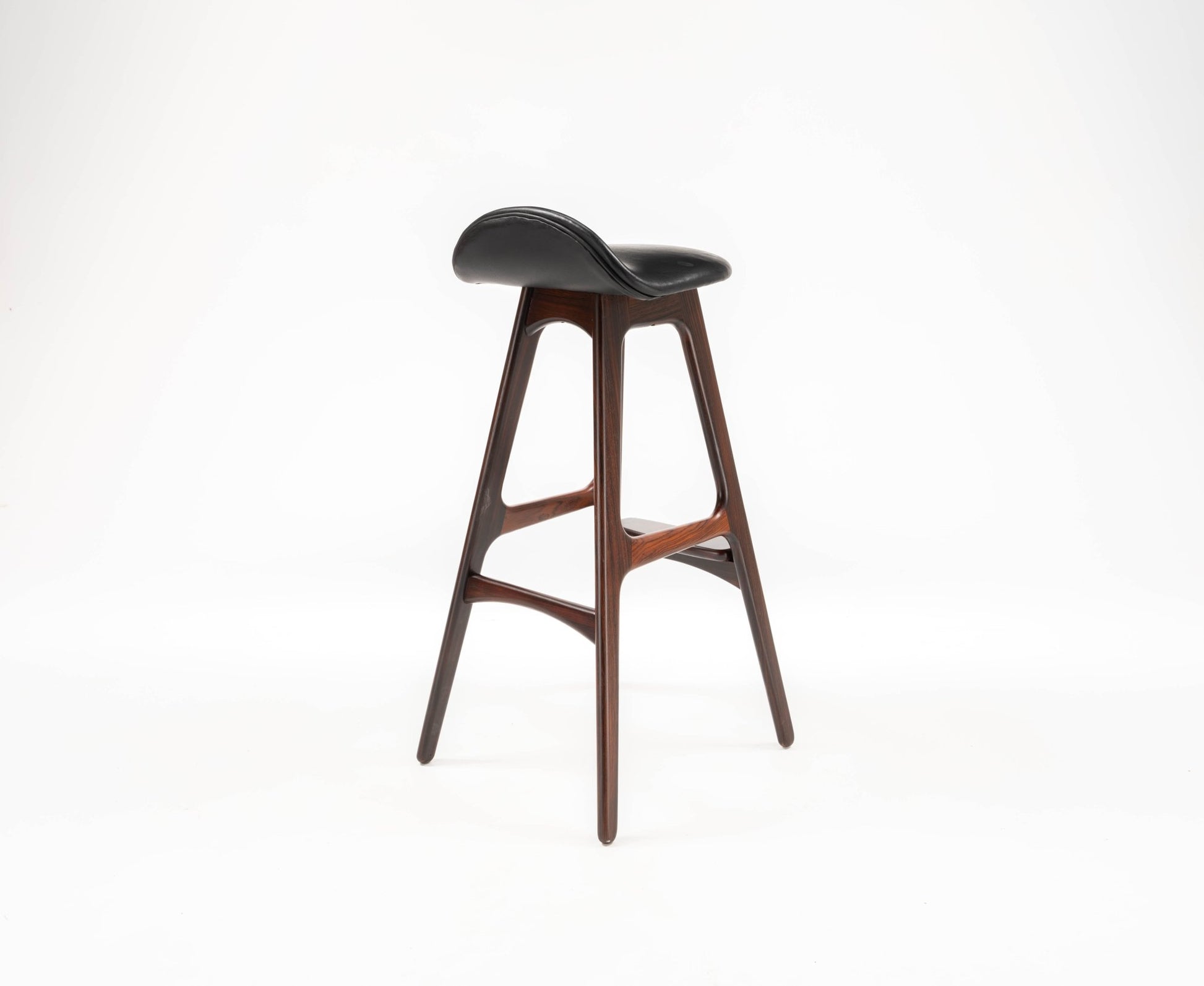 1960s Danish rosewood bar stool by Erik Buch with contoured black leather seat and sculptural frame
