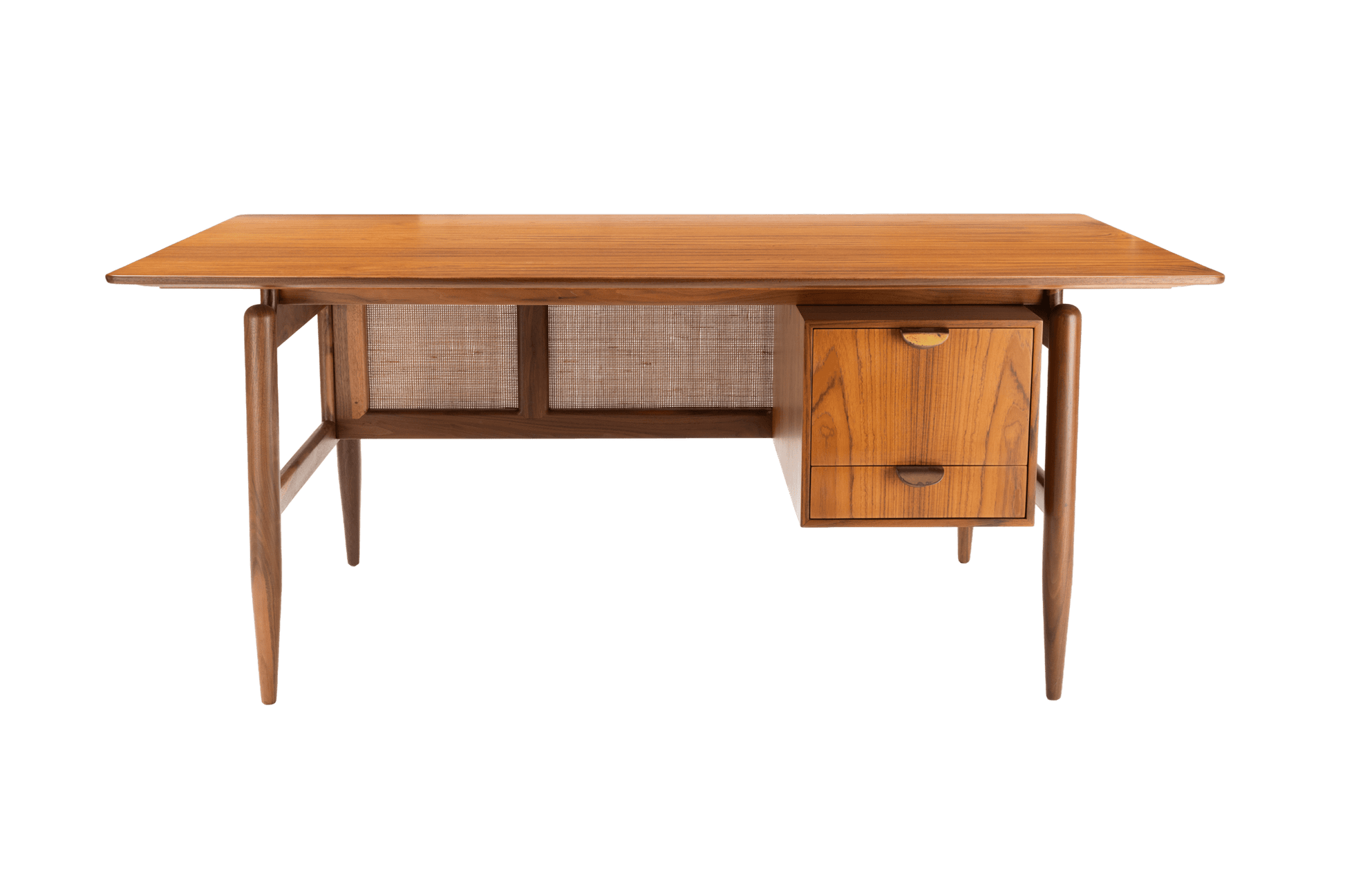 Mid-century modern walnut executive desk with cane panels and two drawers, showcasing elegant 1950s design.