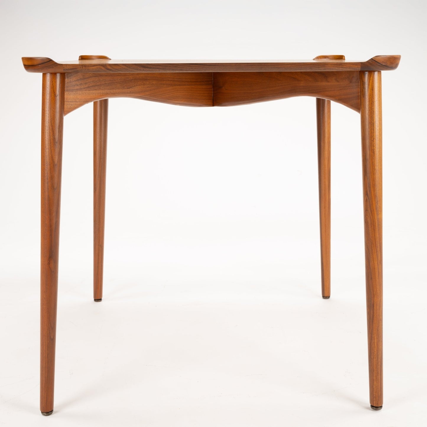 Finn Juhl Walnut Card Table for Baker featuring a sculpted walnut frame with elegantly tapered legs and a smooth rectangular top, reflecting vintage Danish mid century modern design.