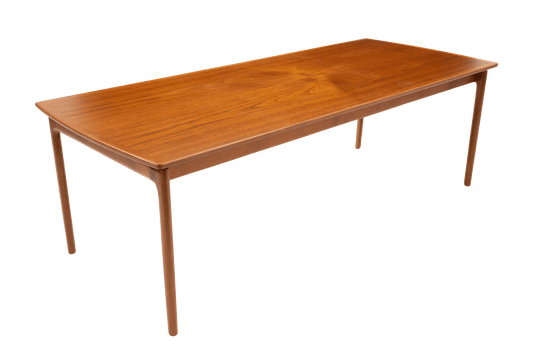 Mid-century modern floating top teak coffee table by Ole Wanscher with slender legs and sleek rectangular design.