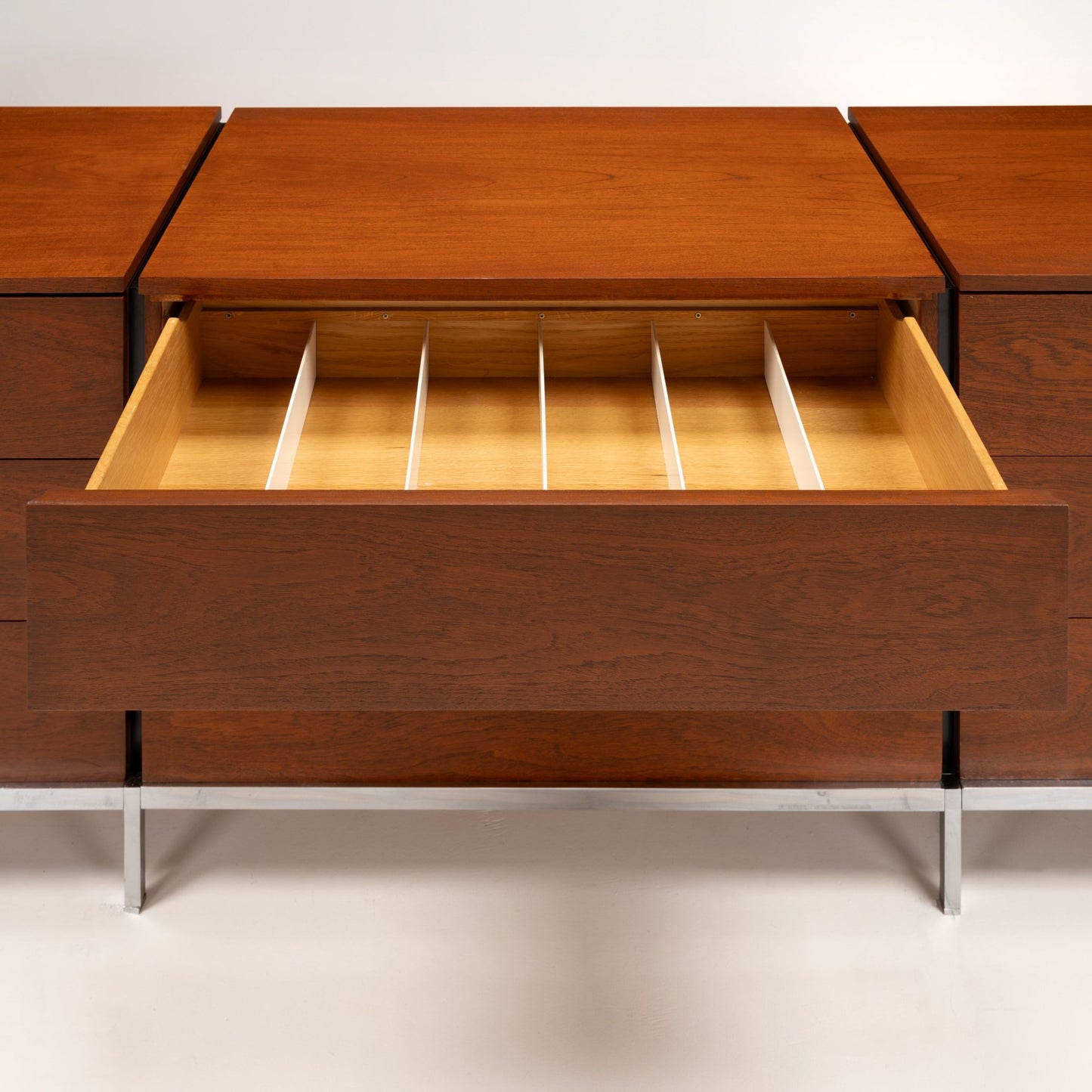 Florence Knoll Walnut Chest of Drawers open drawer with divided cream interior rich walnut grain and slender metal legs in mid century modern furniture style