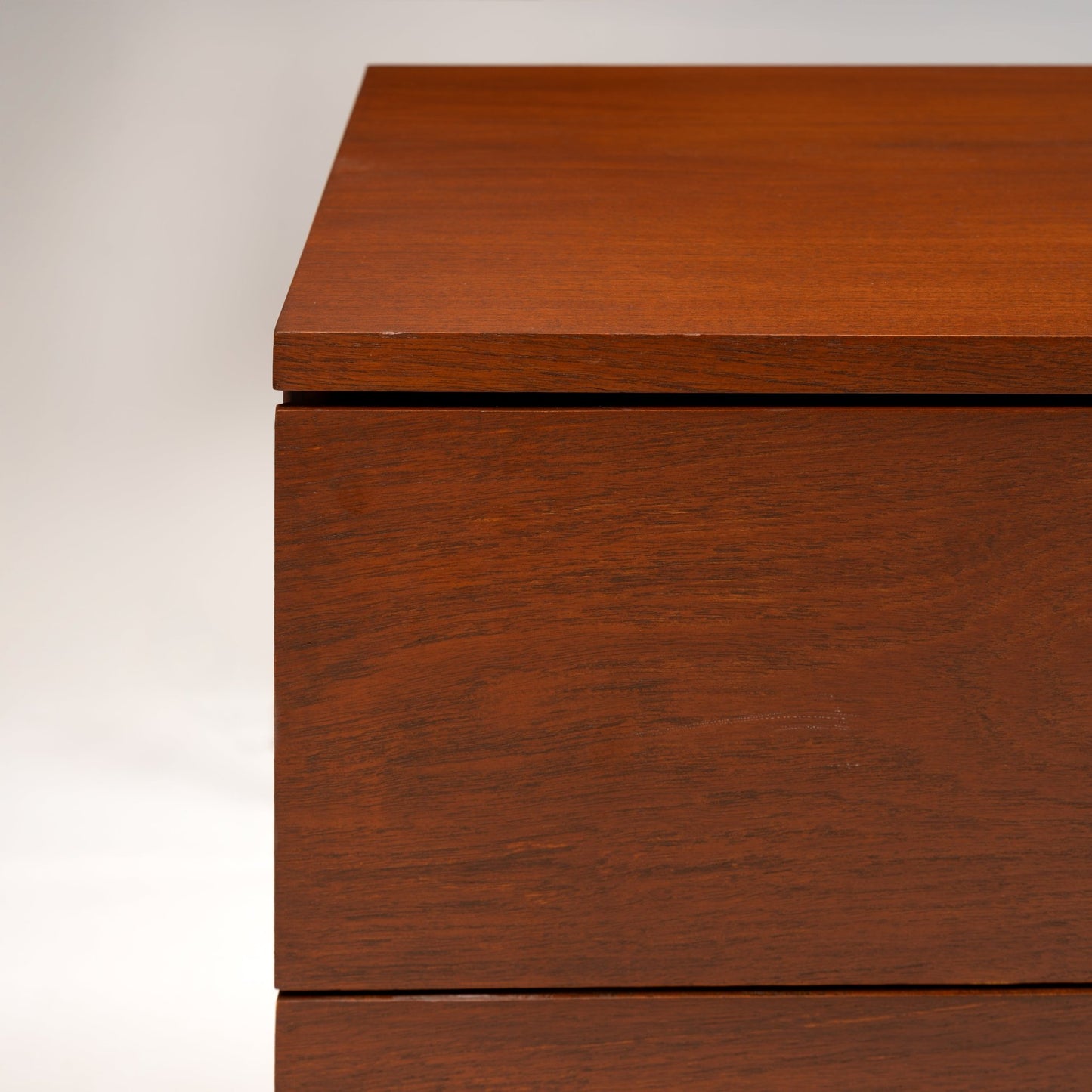 Florence Knoll Walnut Chest of Drawers close detail showing rich walnut grain crisp drawer lines and overhanging top in mid century modern furniture style