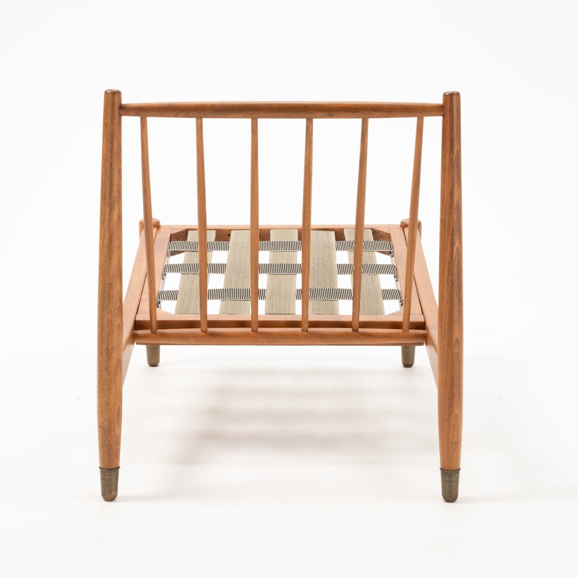 Rear view of Folke Ohlsson slipper chair frame with teak-beechwood slats and woven seat support without cushions