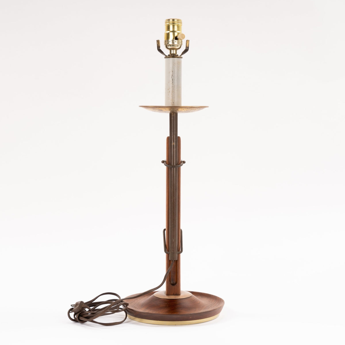 Francis Elkins Attributed Ratchet Table Lamp with slender walnut column brass tray exposed socket ratchet hardware and round wood base in mid century modern lighting
