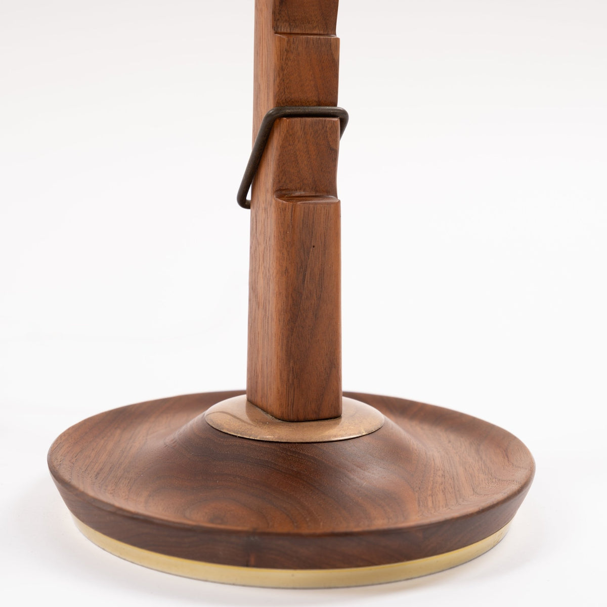 Francis Elkins Attributed Ratchet Table Lamp closeup showing a sculpted walnut column ratchet hardware and rounded wood base with brass trim in mid century modern lighting