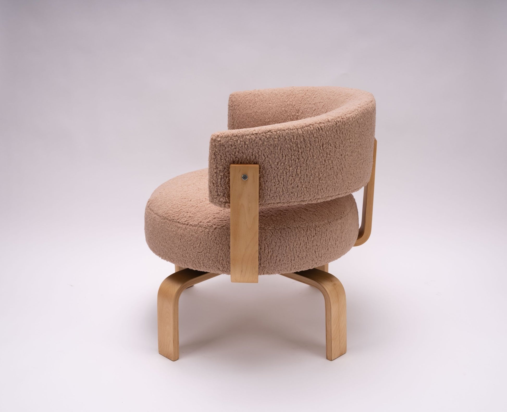 Pair of 2000s Fridene swivel armchairs by Carina Bengs with beech wood frames and faux sheepskin upholstery