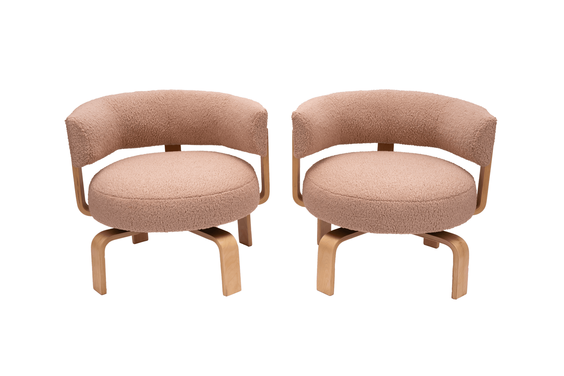 Pair of 2000s Fridene swivel armchairs by Carina Bengs with maharam faux sheepskin upholstery and beechwood frame.