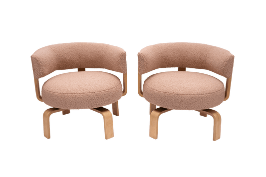 Pair of 2000s Fridene swivel armchairs by Carina Bengs with maharam faux sheepskin upholstery and beechwood frame.