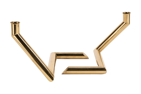 1970s Danish Go Products polished brass candle holders with angular zigzag form and sculptural design on white background