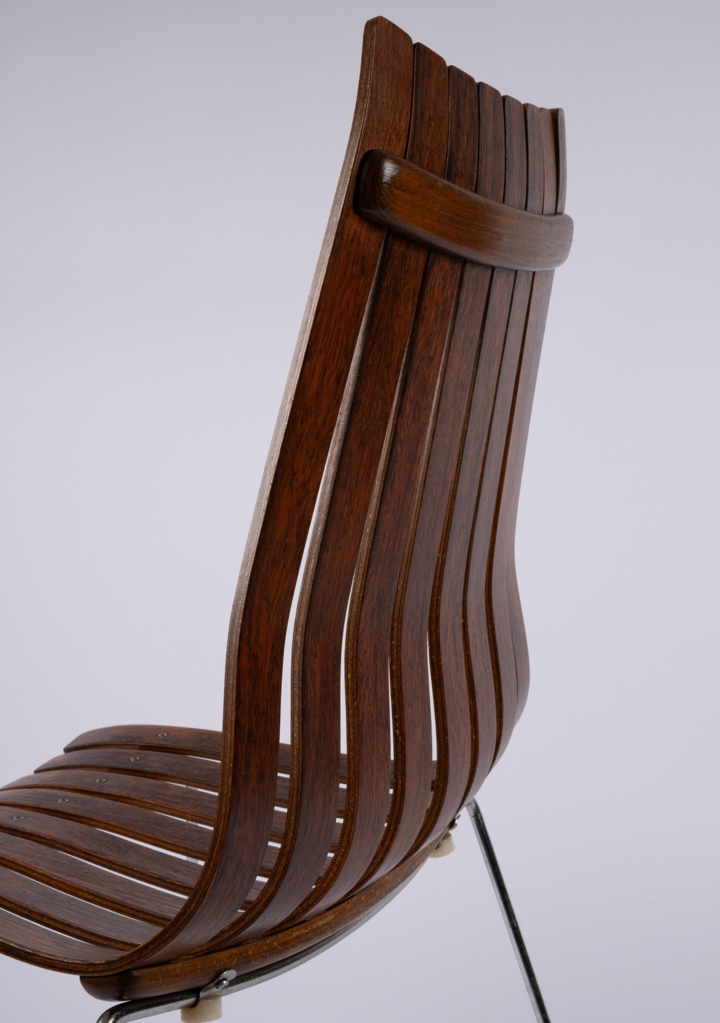 High back rosewood dining chair by Hans Brattrud for Hove Mobler with curved laminated slats and chrome frame, 1960s Norway.