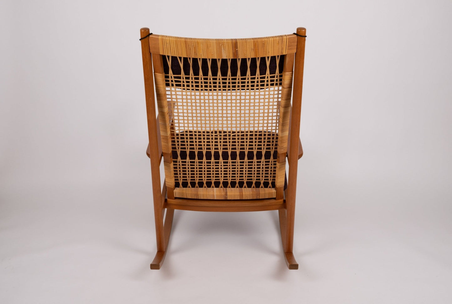 Hans Olsen 1960s teak wood rocking chair with new cane back and newly upholstered cushions from Denmark