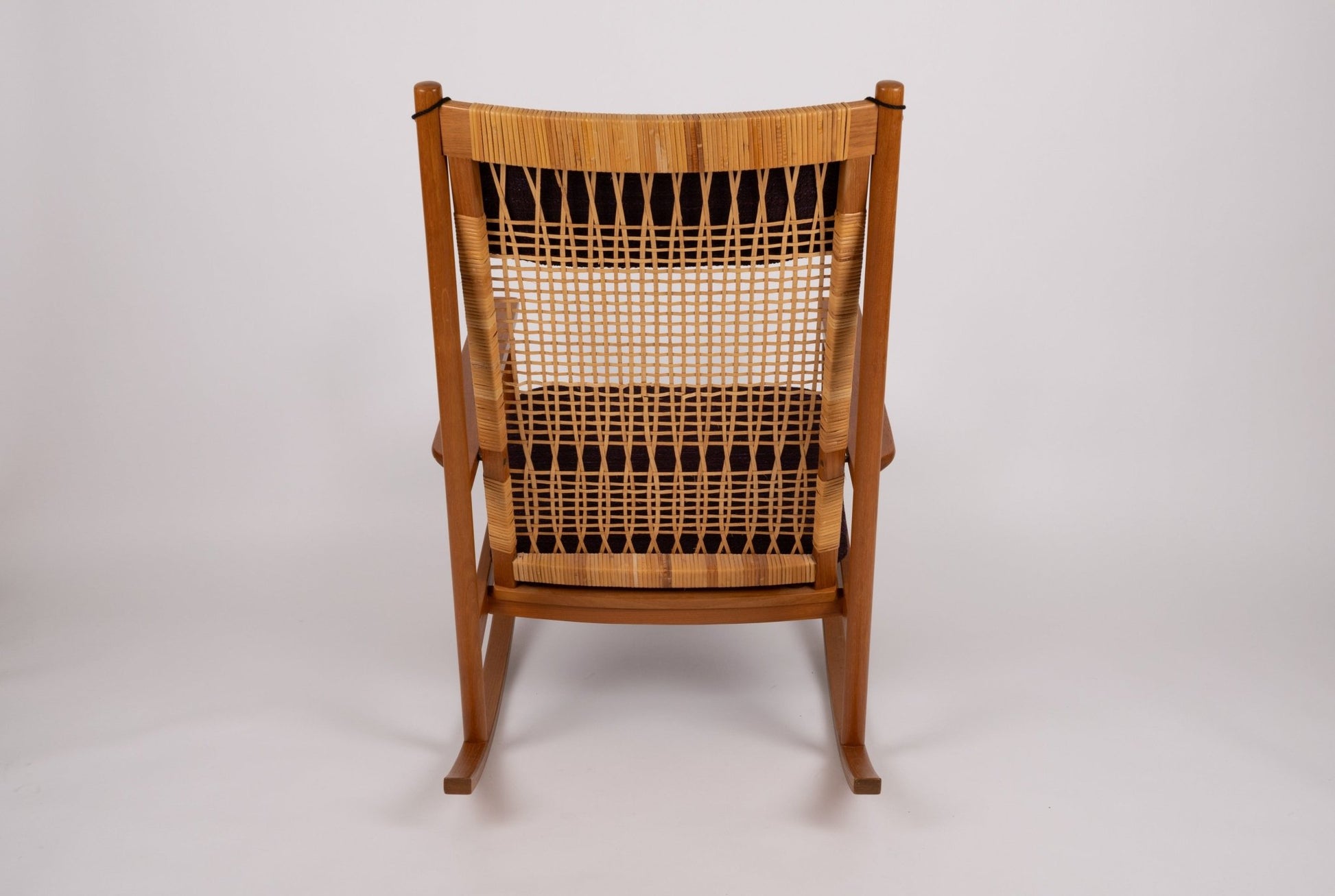 Hans Olsen 1960s teak wood rocking chair with new cane back and newly upholstered cushions from Denmark