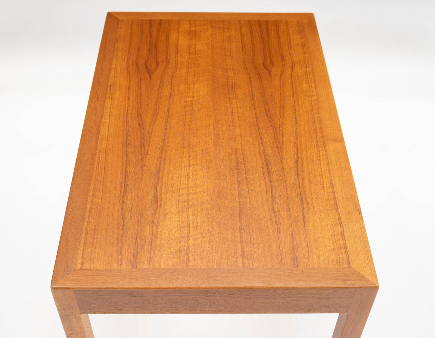 Pair of Danish teak side tables by Hans Wegner with clean lines and minimalist mid-century modern design.