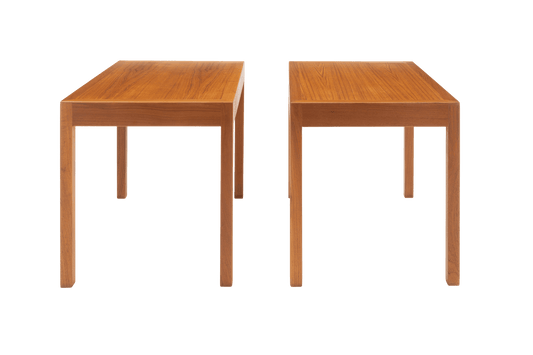 Two wooden side tables on a white background