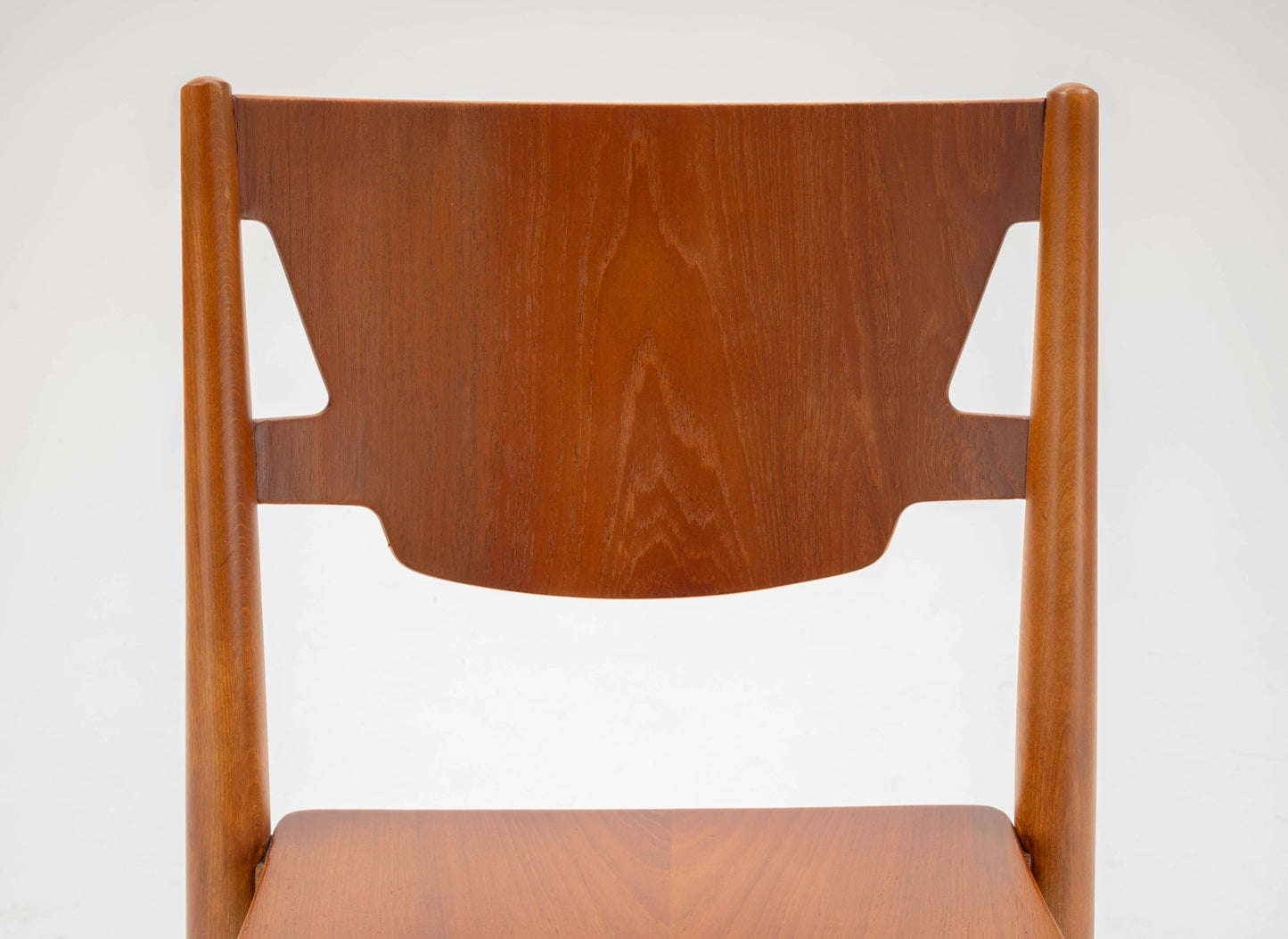 Mid-century modern Hvidt & Molgaard teak and beech desk chair with curved backrest and flared tapered legs