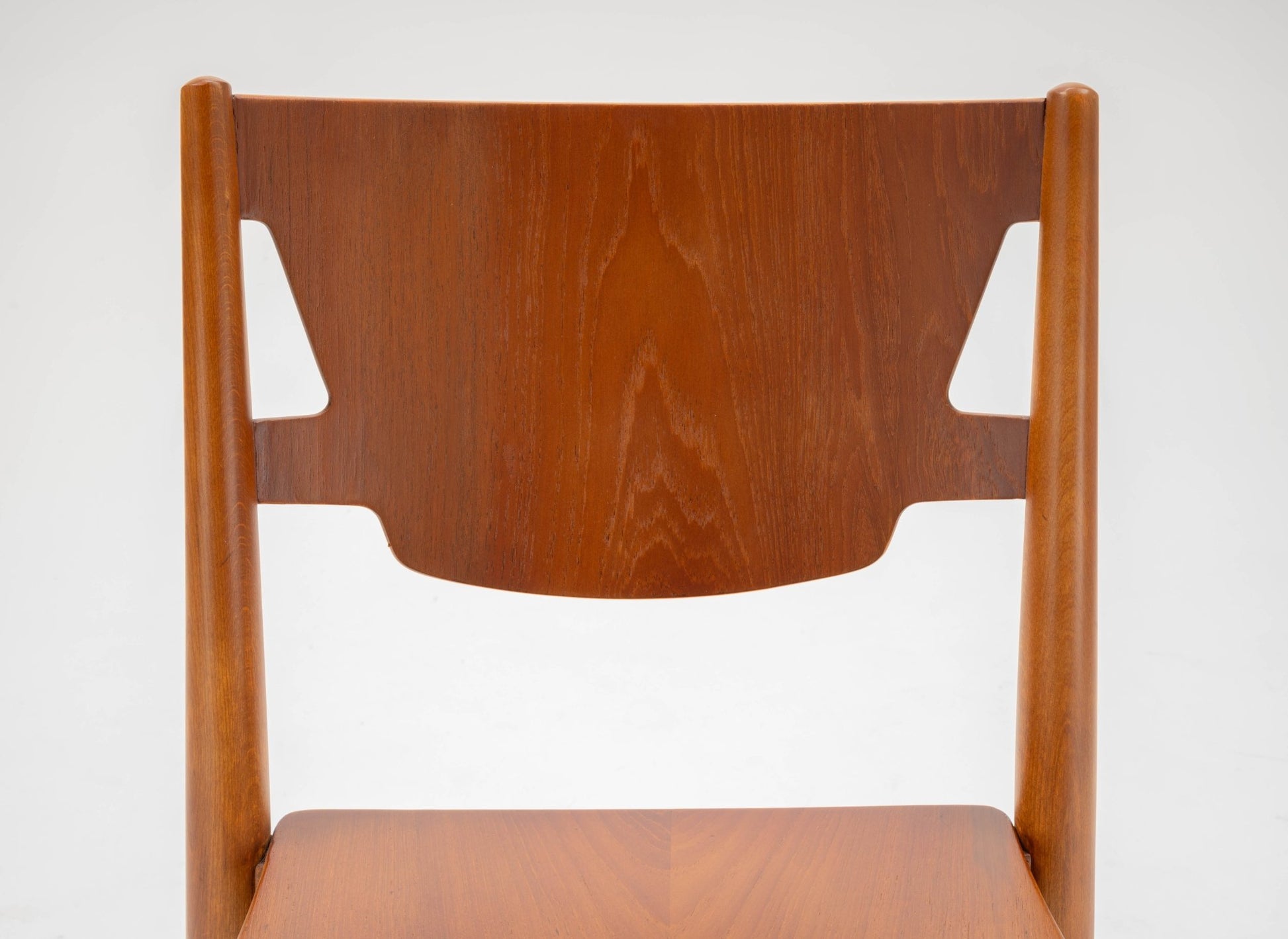 Mid-century modern Hvidt & Molgaard teak and beech desk chair with curved backrest and flared tapered legs