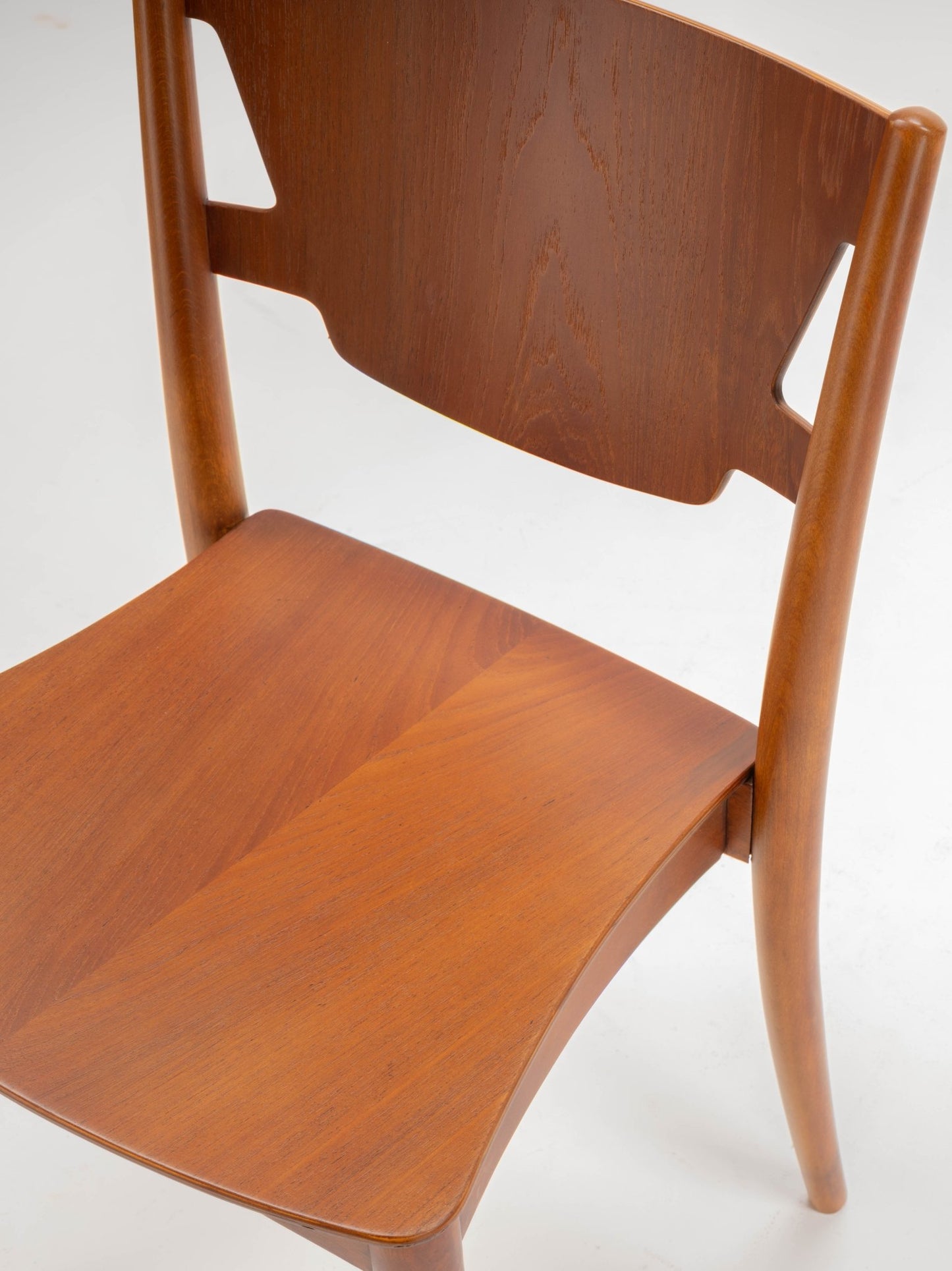 Mid-century modern desk chair by Hvidt & Molgaard with curved teak backrest and smooth beech seat.