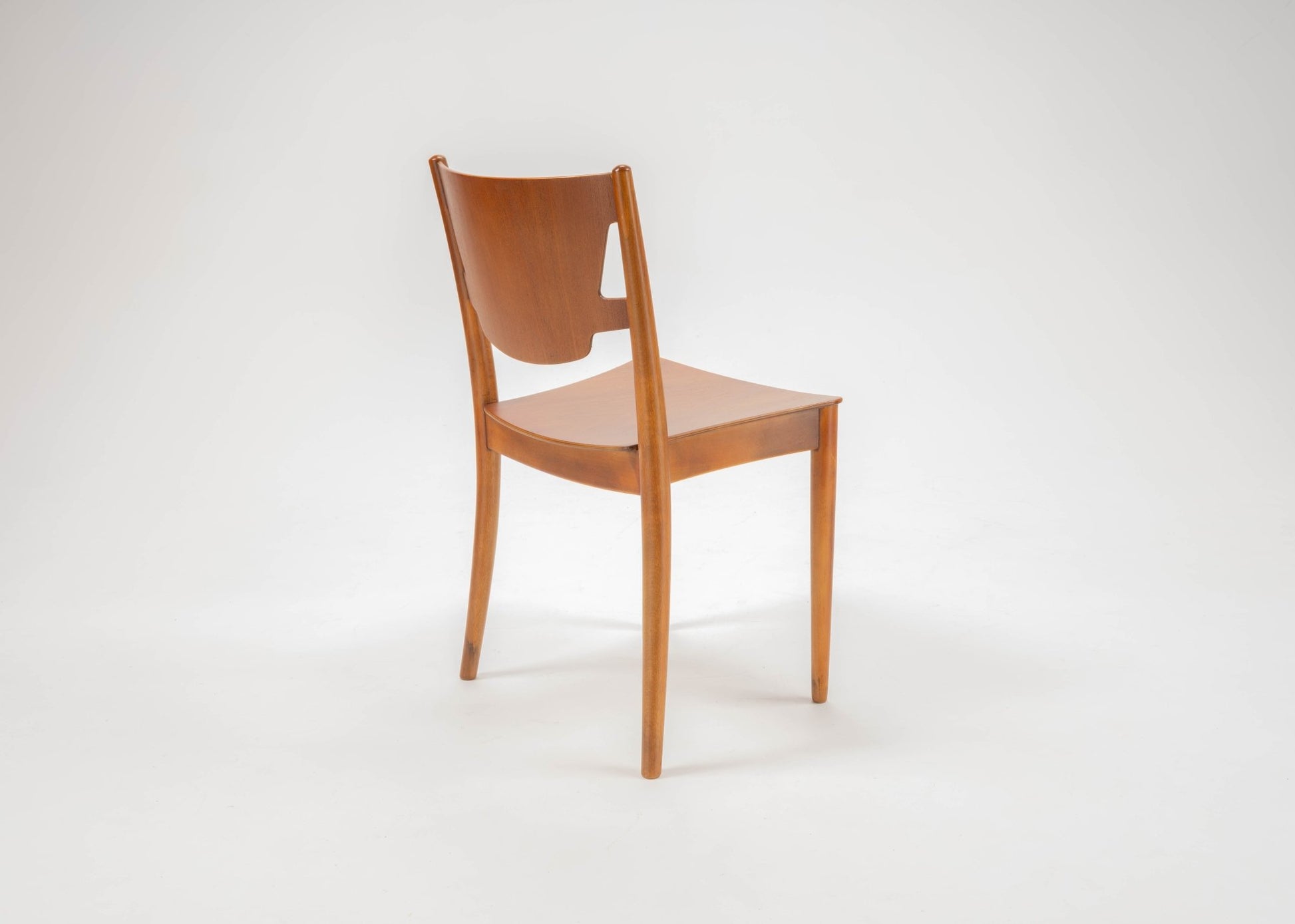 1950s Danish desk chair by Hvidt & Molgaard in beech and teak with curved backrest and tapered legs.