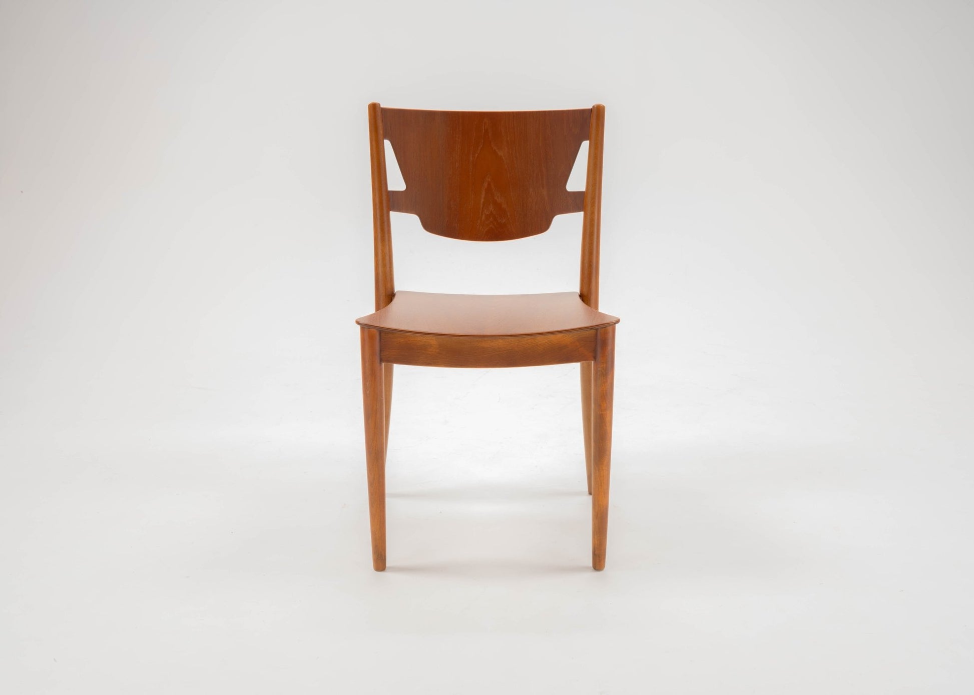 Mid-century modern desk chair by Hvidt & Molgaard with teak and beech wood construction and sculpted backrest.