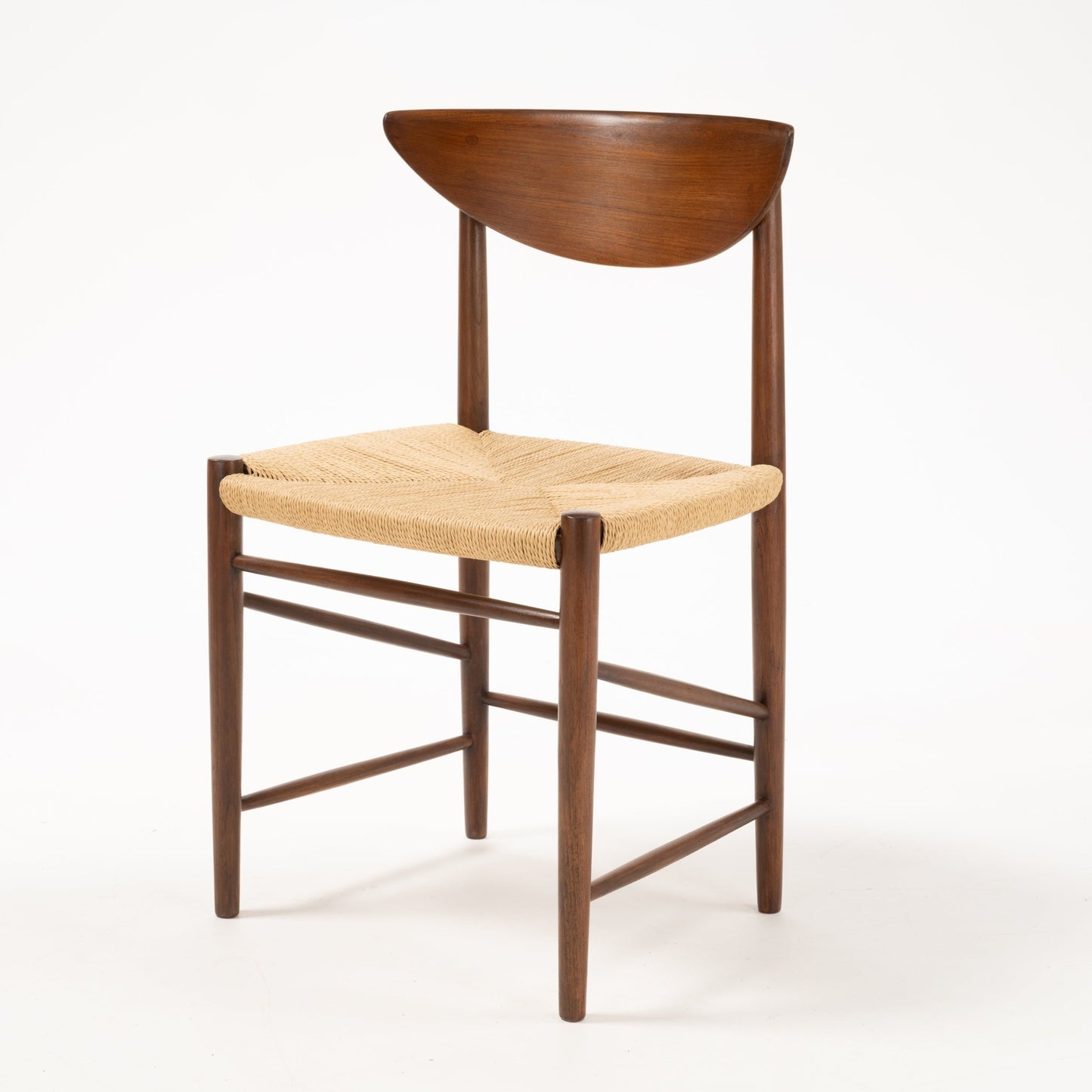 Single Hvidt & Molgaard Model 316 chair with sculpted crescent teak backrest and woven natural fiber seat on solid wood frame