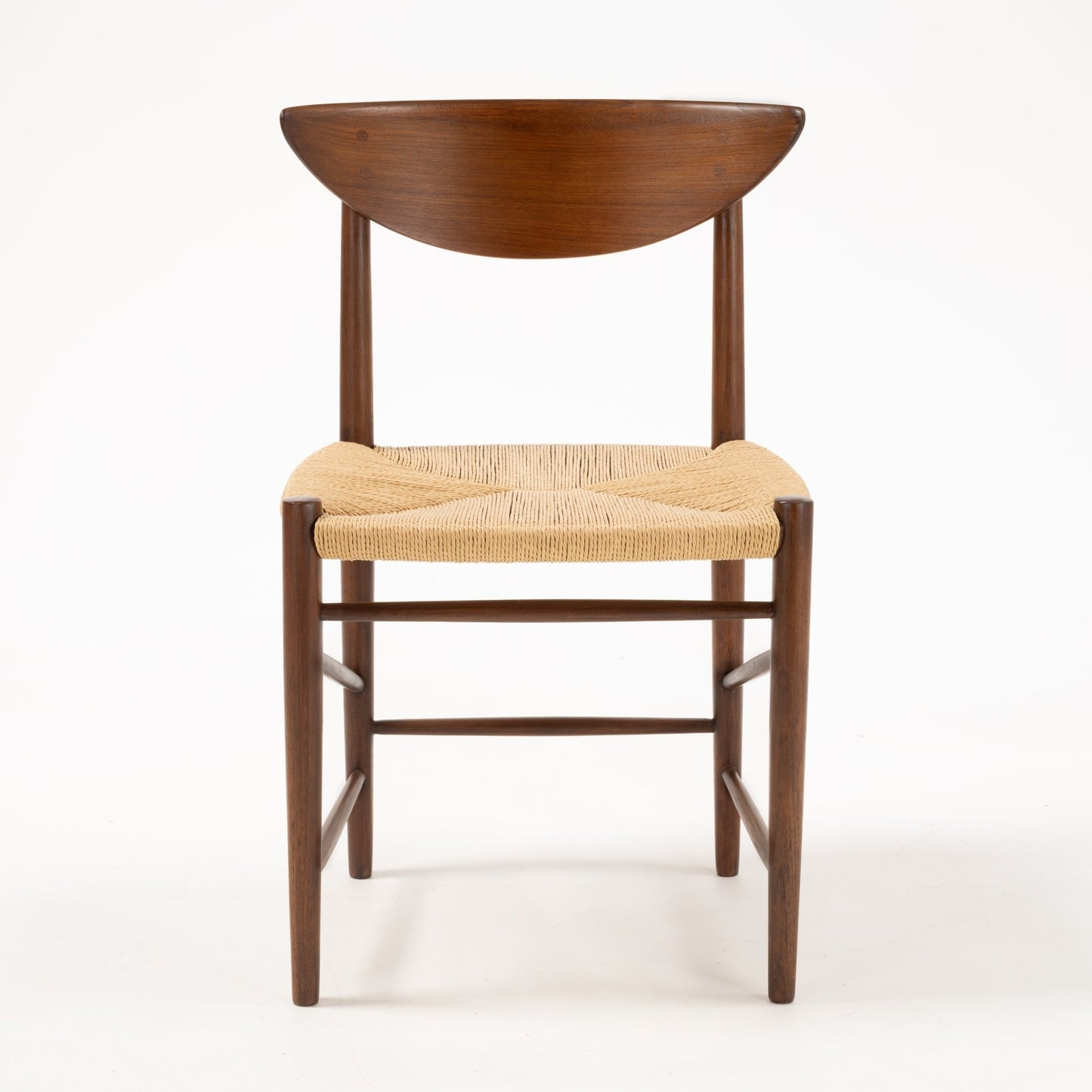 Front view of Hvidt & Molgaard Model 316 chair with sculpted crescent-shaped teak backrest and woven natural fiber seat