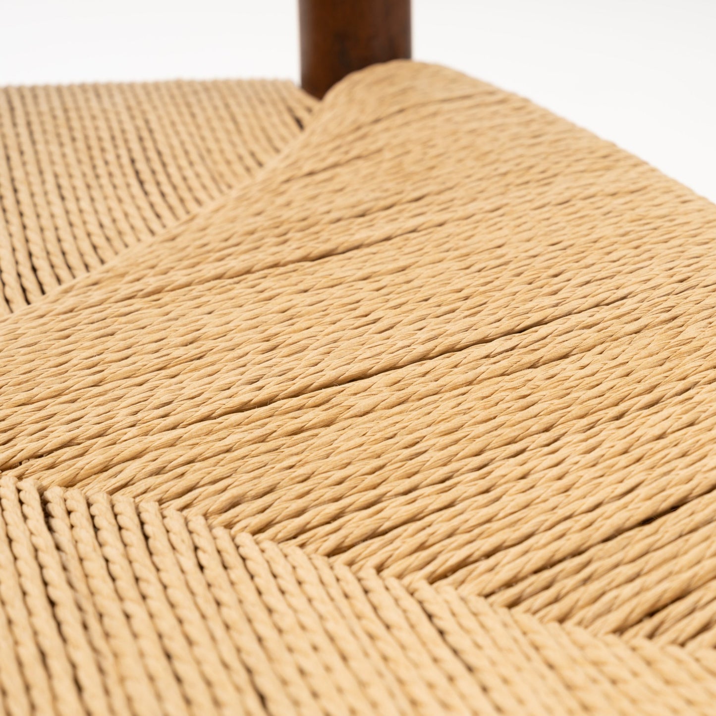 Detailed view of tightly woven natural fiber seat on teak frame of Hvidt & Molgaard Model 316 chair pair